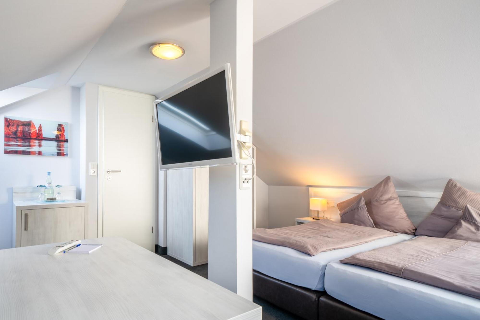 Hotel Hochseeinsel Хелголанд Стая снимка